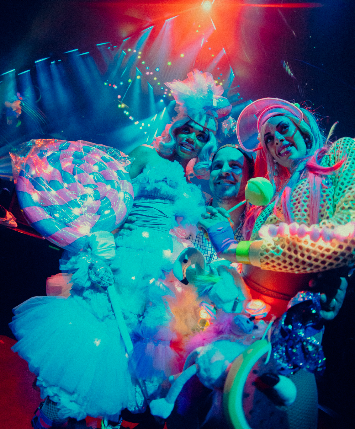 People wearing colorful costumes during Candy World